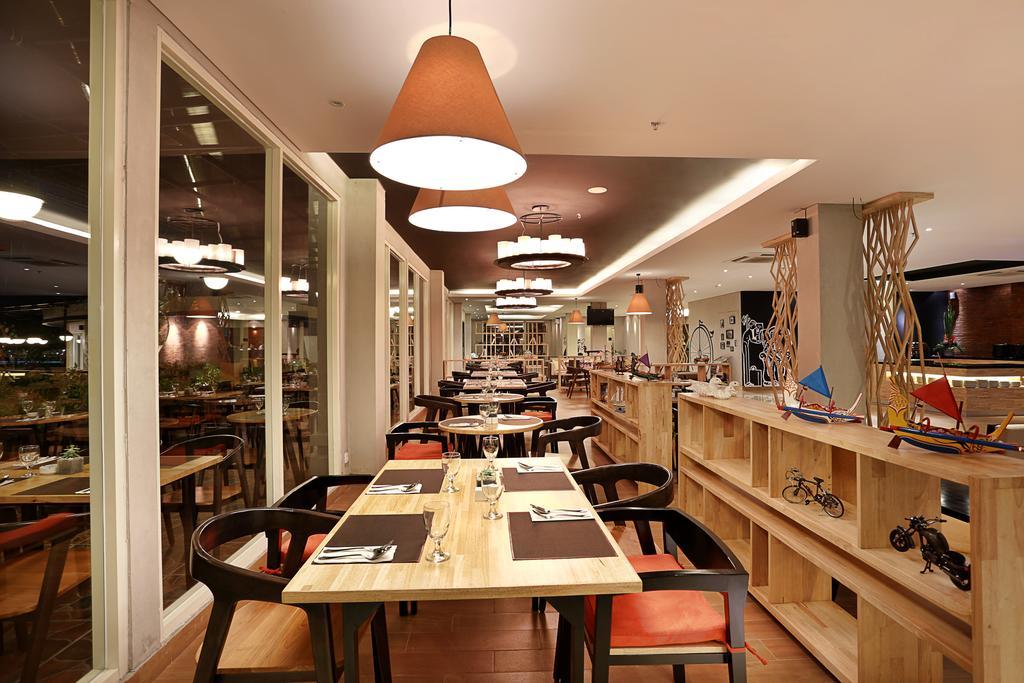 登巴萨金色郁金香基本酒店 丹帕沙 外观 照片